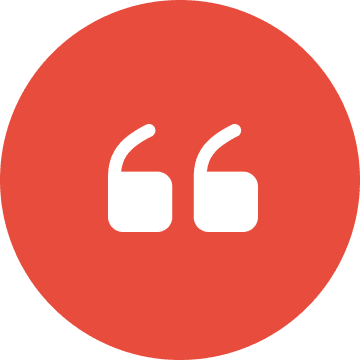 Red circle with white quotation marks.